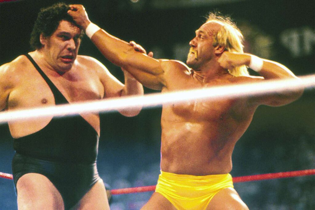 Hulk-Hogan-and-Andre-the-Giant-021623-ff4cbe82358e4c24916552c509578e0a Hulk Hogan battles Andre the Giant in an iconic WWE match, showcasing the intensity and drama of their legendary rivalry in the wrestling ring.